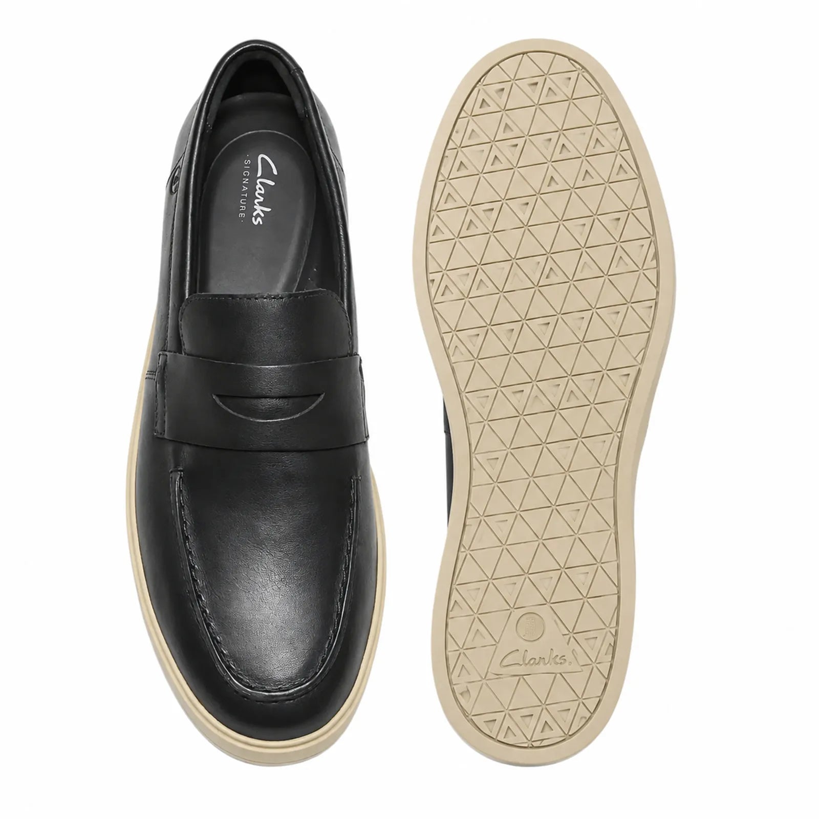 Pair of men's black leather penny loafers, showing sole tread and padded interior
