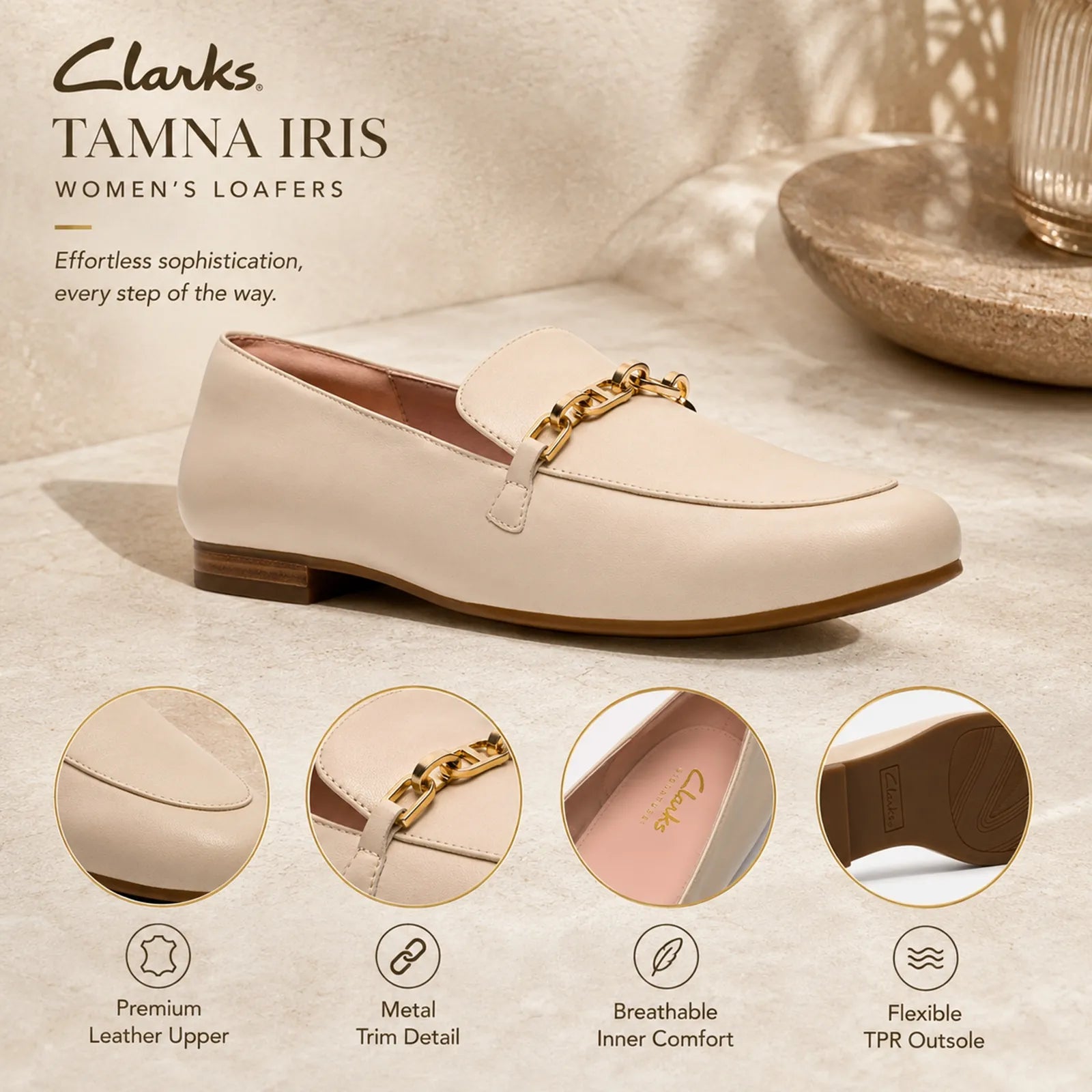 Close-up detail of Clarks Tamna Iris white leather loafers with decorative metal hardware