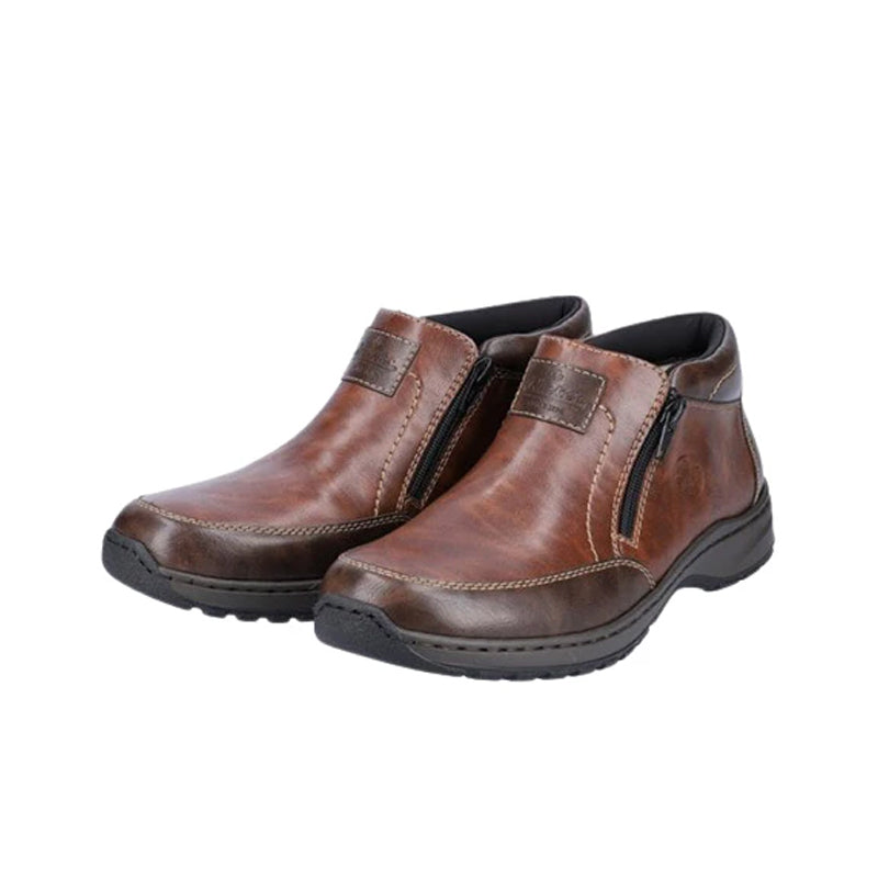 Pair of men's brown ankle boots with two pull tabs and side zipper