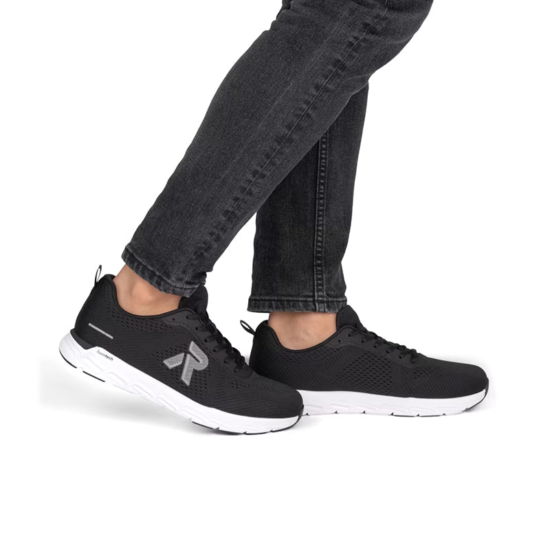 Men's black lace-up sneakers with knit upper and white cushioned sole