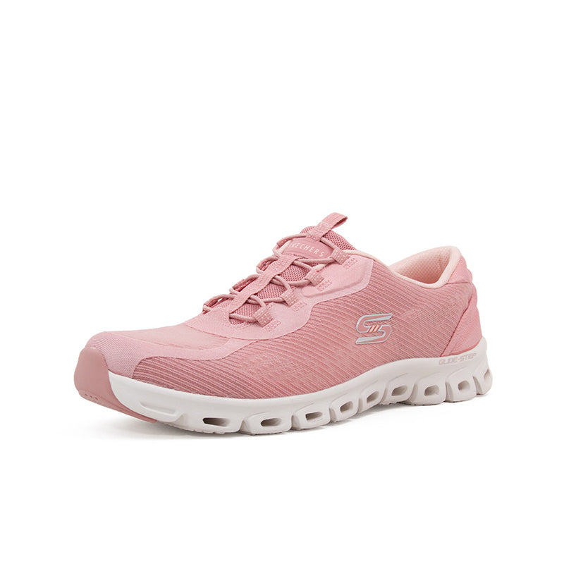 Pink textile lace-up women’s sneaker with white midsole and tread pattern