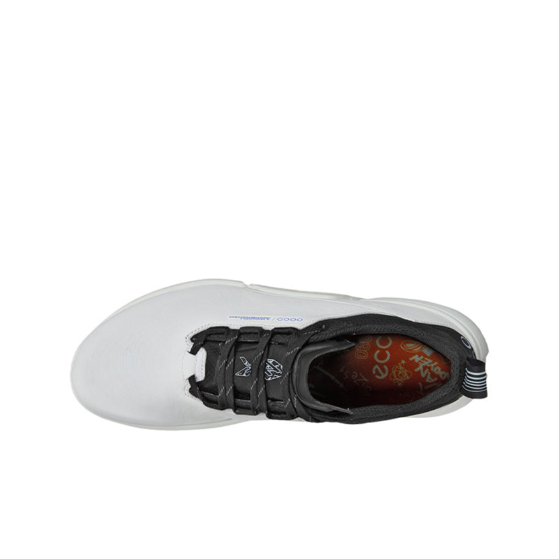 ECCO men's casual shoe side view: white leather upper with black laces, brown interior