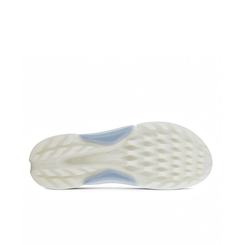 White womens golf shoe outsole with textured traction tread and blue heel accent