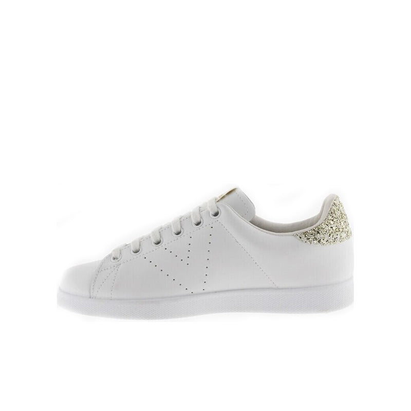White low-top sneaker with perforated panels and gold glitter side heel trim