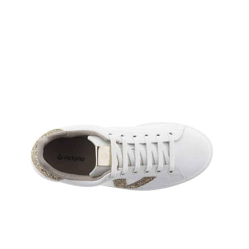 White low-top sneakers with lace-up front, cushioned lining, and glitter heel