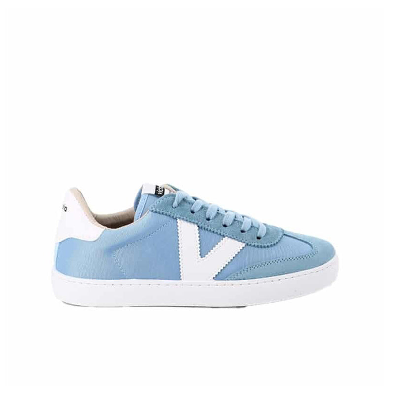 Light blue low-top lace-up sneakers with white side stripe and white rubber sole