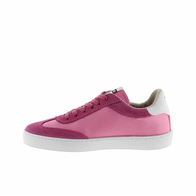 Fuchsia low-top sneakers with lace-up front and white heel panel, rubber sole