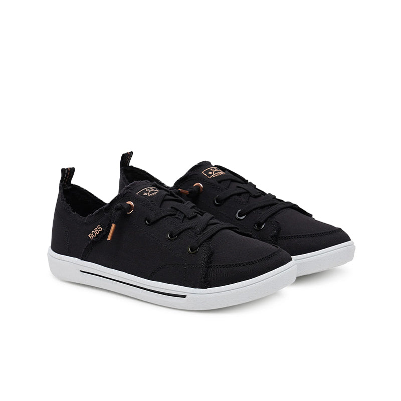 Pair of black canvas low-top sneakers with lace-up front and tan accent eyelets