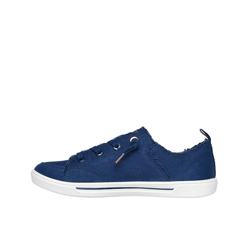 Women's blue canvas low-top sneaker with white rubber sole and laces