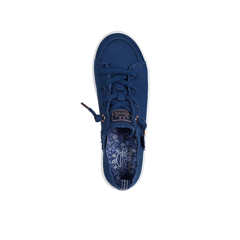Women's blue canvas sneaker heel view, lace-up with textured insole
