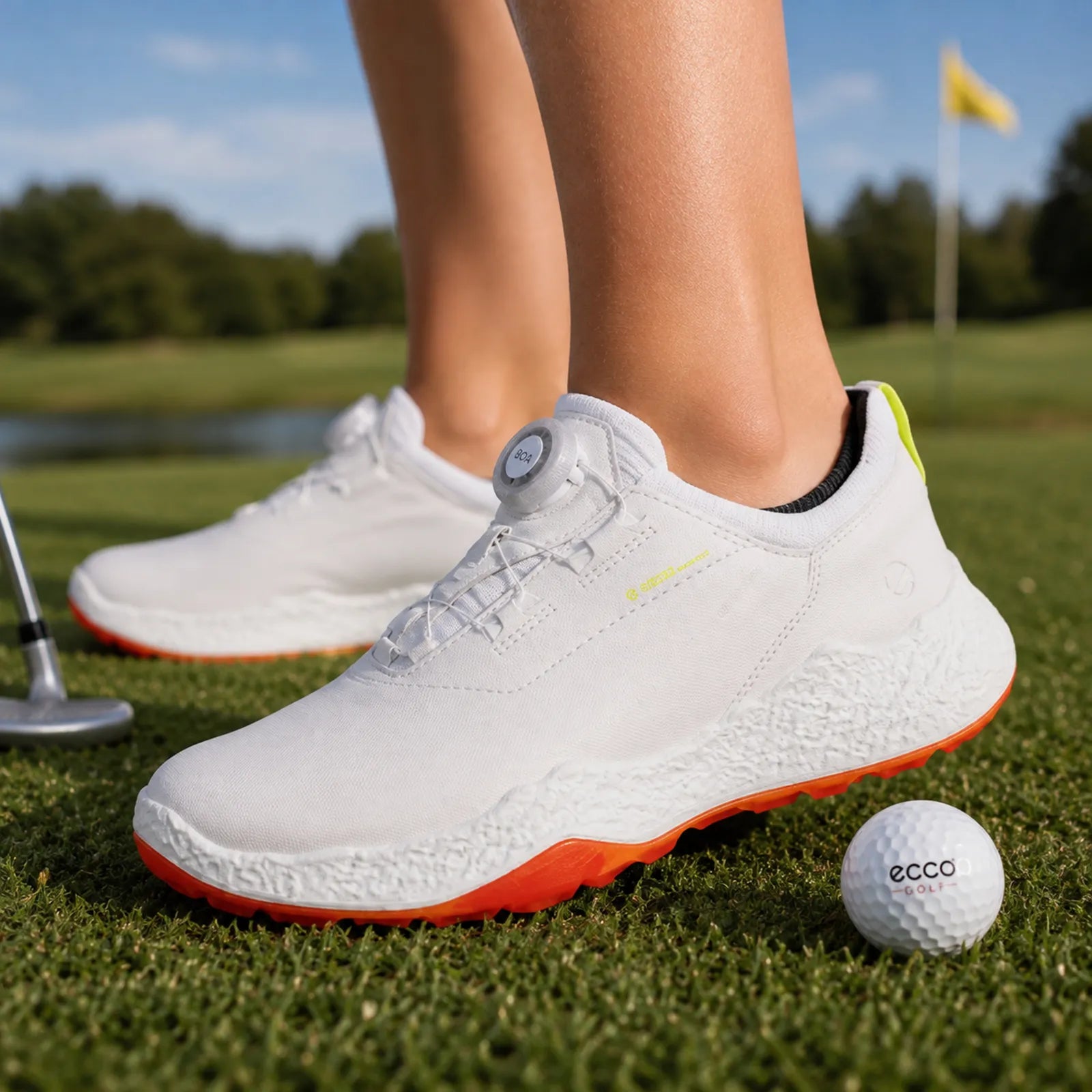 ECCO Golf Biom H5 BOA women's white waterproof golf shoes worn for stable comfort on the golf course