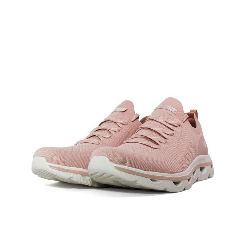 Pink textile lace-up Skechers Arc Waves women’s sneaker, angled side view.