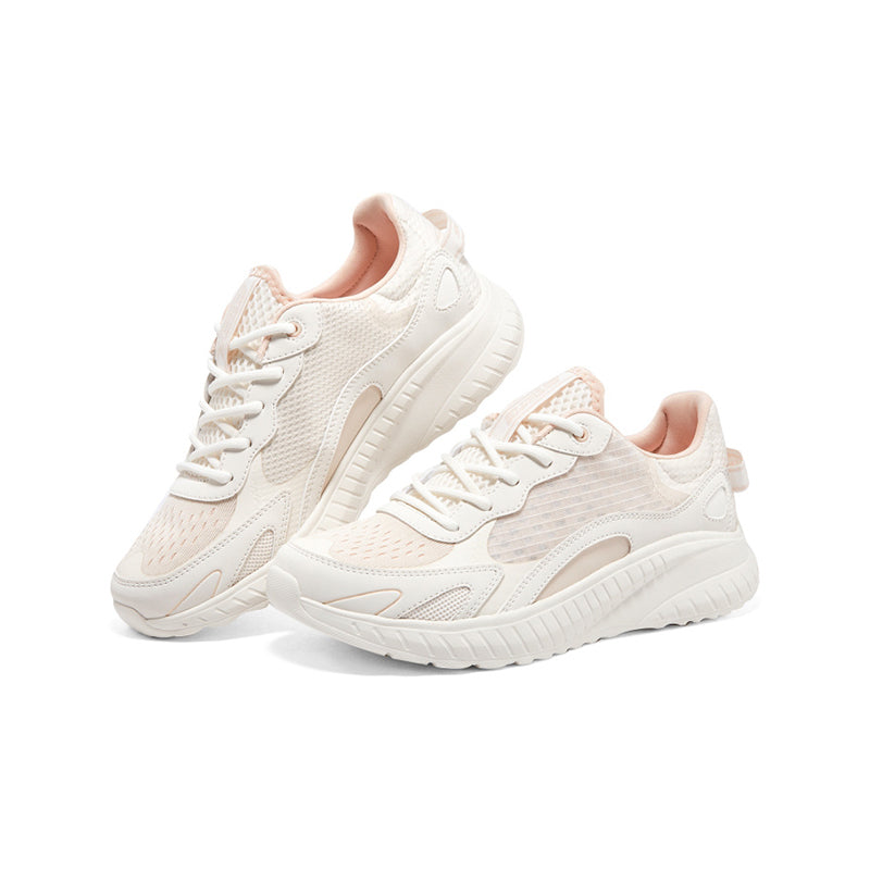 White women's sneakers pair view with lace-up fronts and thick cushioned sole