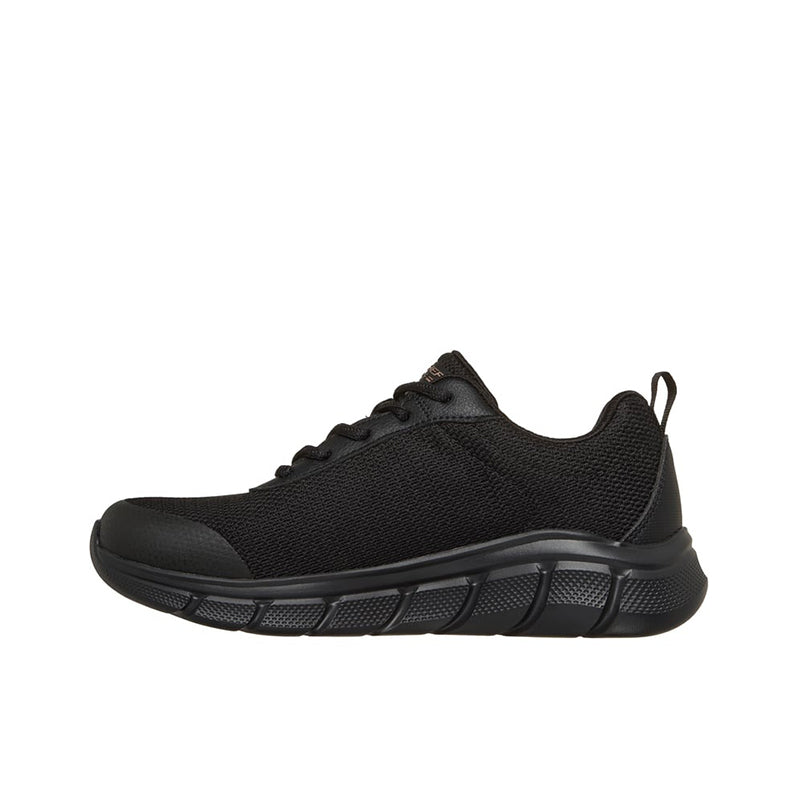 Women's waterproof black lace-up trainers, side view with grippy tread outsole
