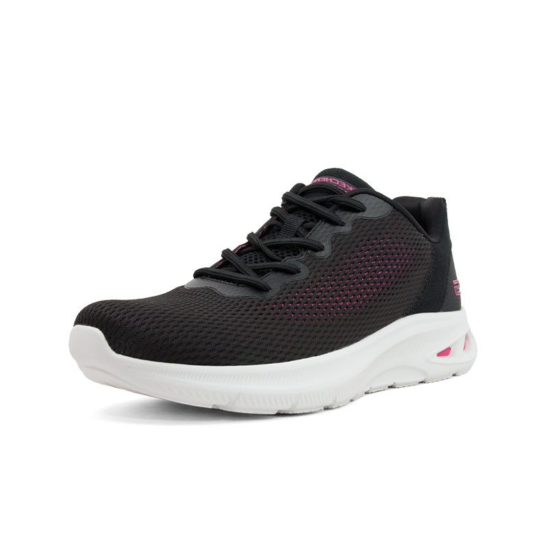 Black lace-up women’s sneaker with white sole and small pink accent details