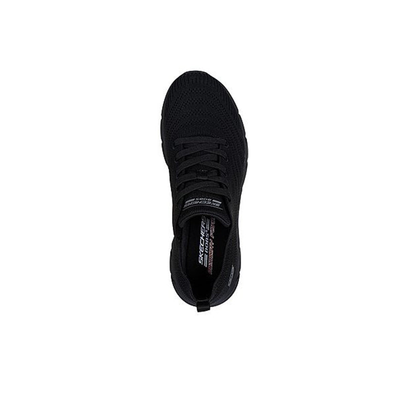 Black lace-up sneaker heel view with padded collar and fabric lining