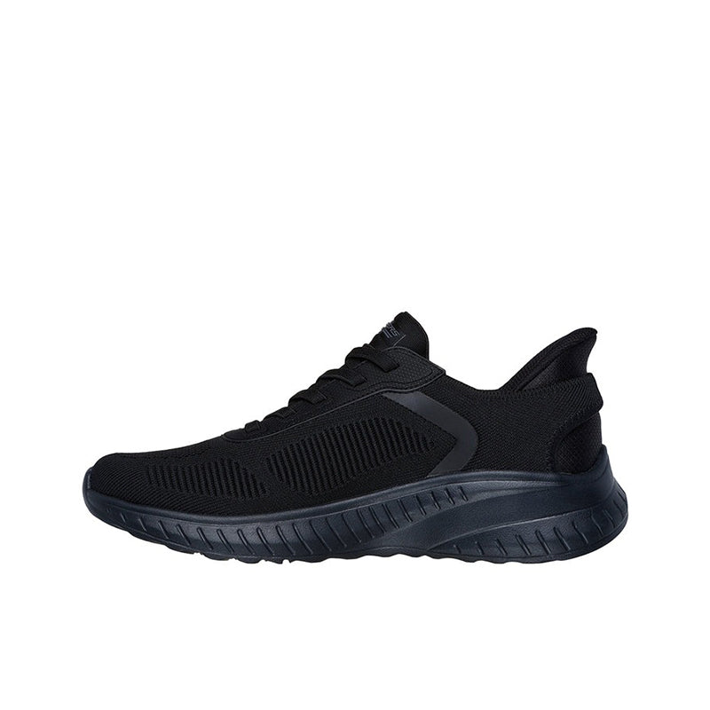 Men's black slip-on sneakers with textured upper and dark cushioned midsole