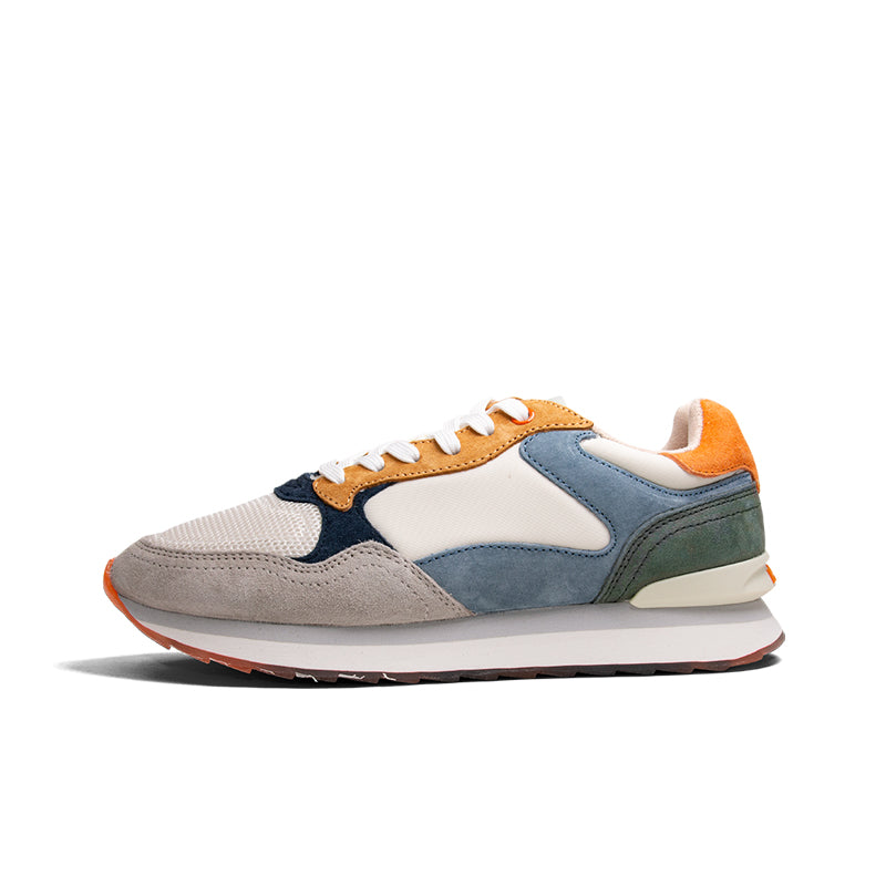 Multicolor leather low-top sneakers, side view, white laces and green heel panel