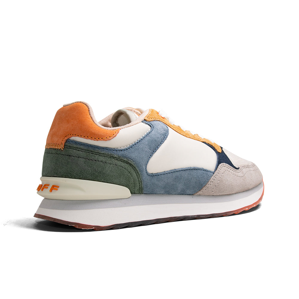 Multicolor leather low-top sneakers, back view with orange heel and green suede panel