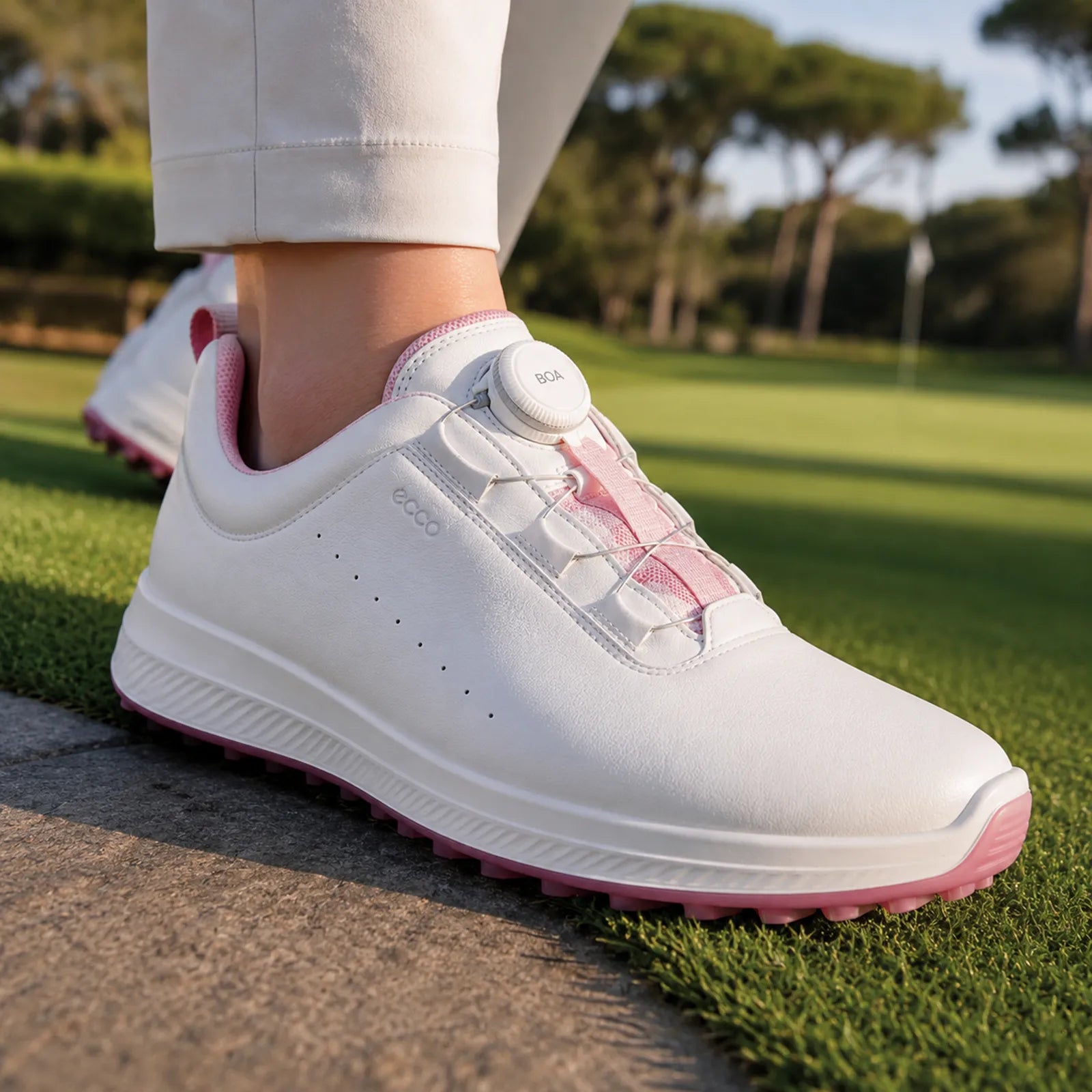 ECCO Golf LT1 women's White/Pink golf shoes worn for comfort and stability on the course