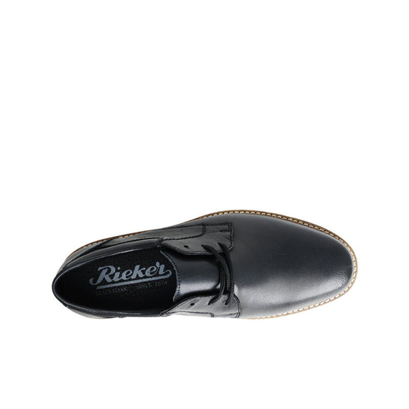 Rieker branded black leather lace-up shoe tongue and lace-up panel close-up