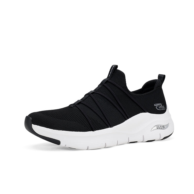 Black textile slip-on style women's sneakers with strap details and white sole