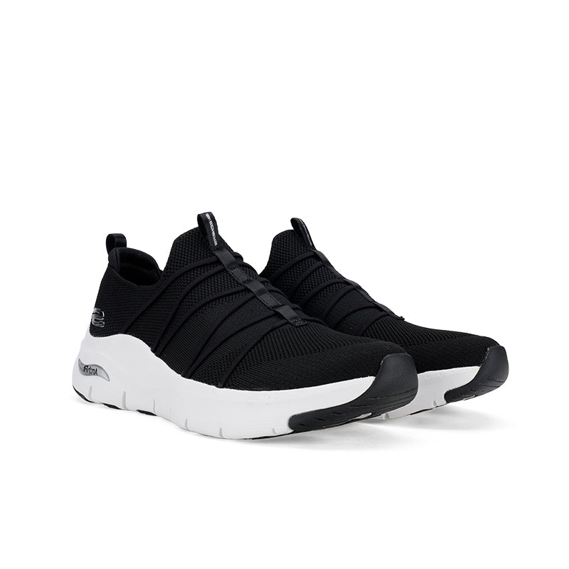 Black knit women's sneakers with arch support label, two straps, and white sole