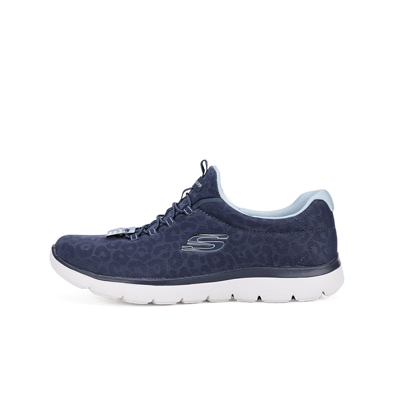 Navy women's lace-up sneaker, side view, cushioned white sole and S logo