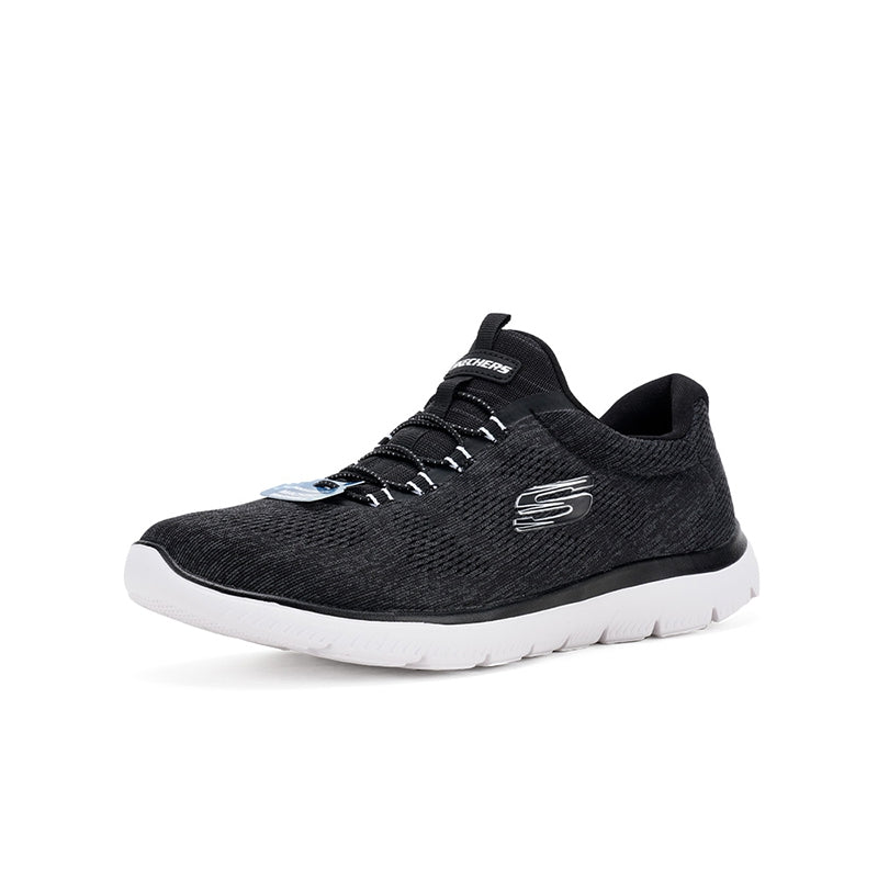 Black textile women's sneaker side view with S logo and white sole