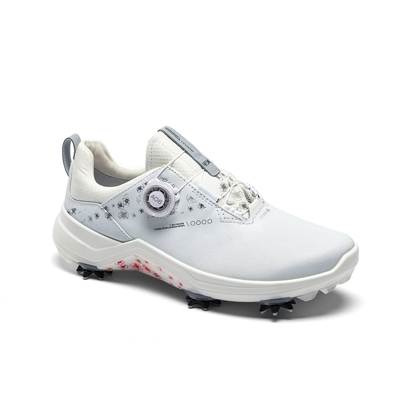 White women's golf shoe with BOA dial, textured upper, and cleated traction sole