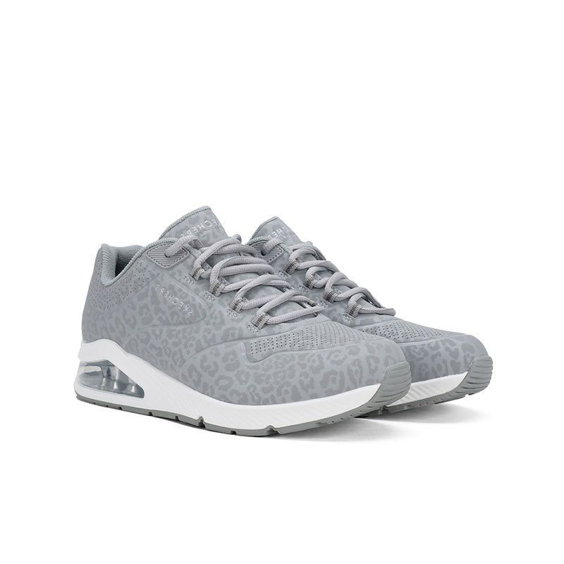 Grey women's sneakers with leopard-pattern upper, lace-up, and white midsole