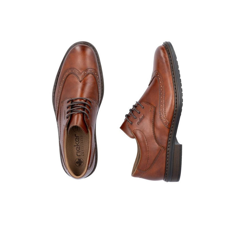 Pair of men's dark brown leather brogue dress shoes with lace-up closure
