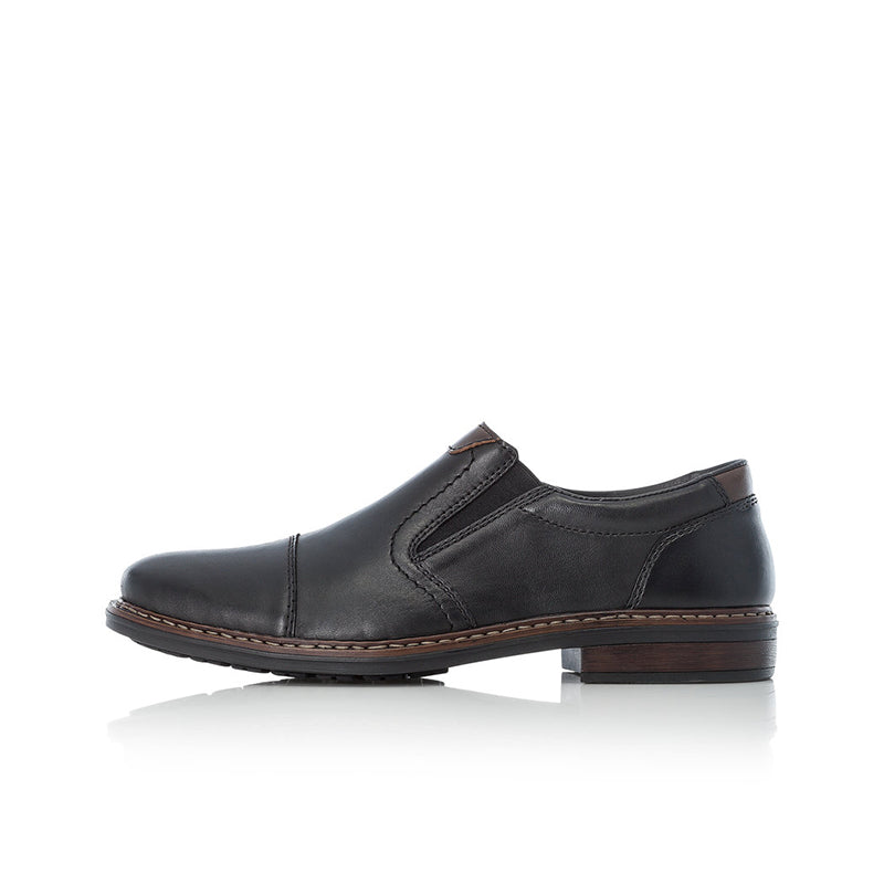 Black leather slip-on business shoe, side view with stitched collar panel