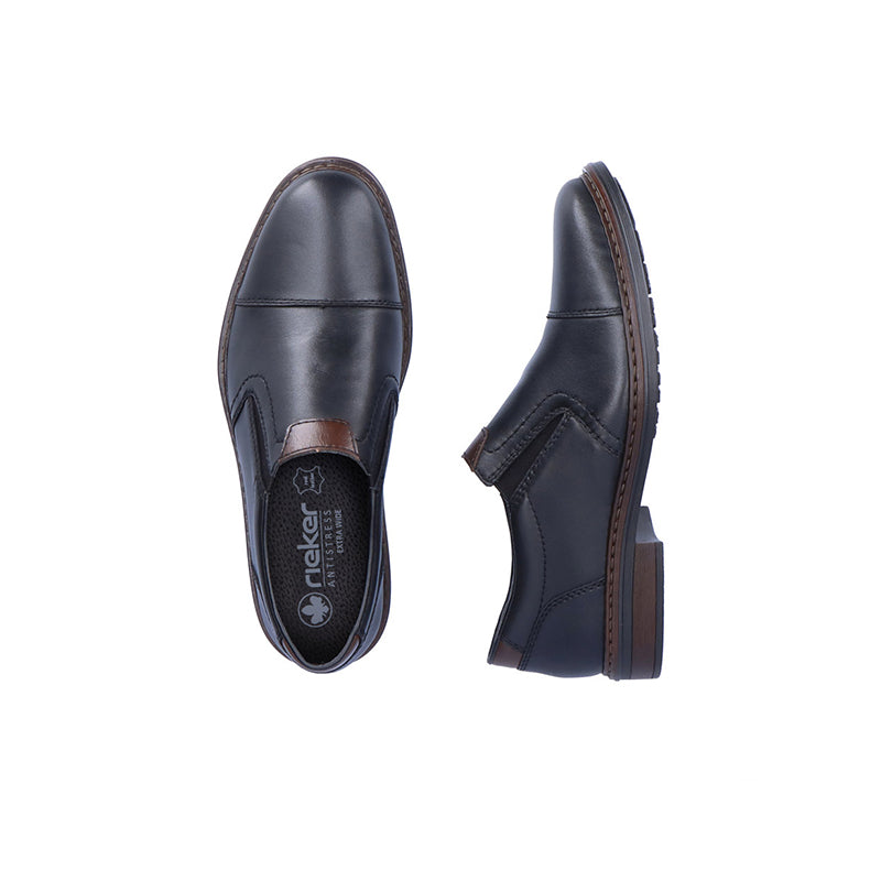 Black leather slip-on shoe, top and sole views showing interior logo