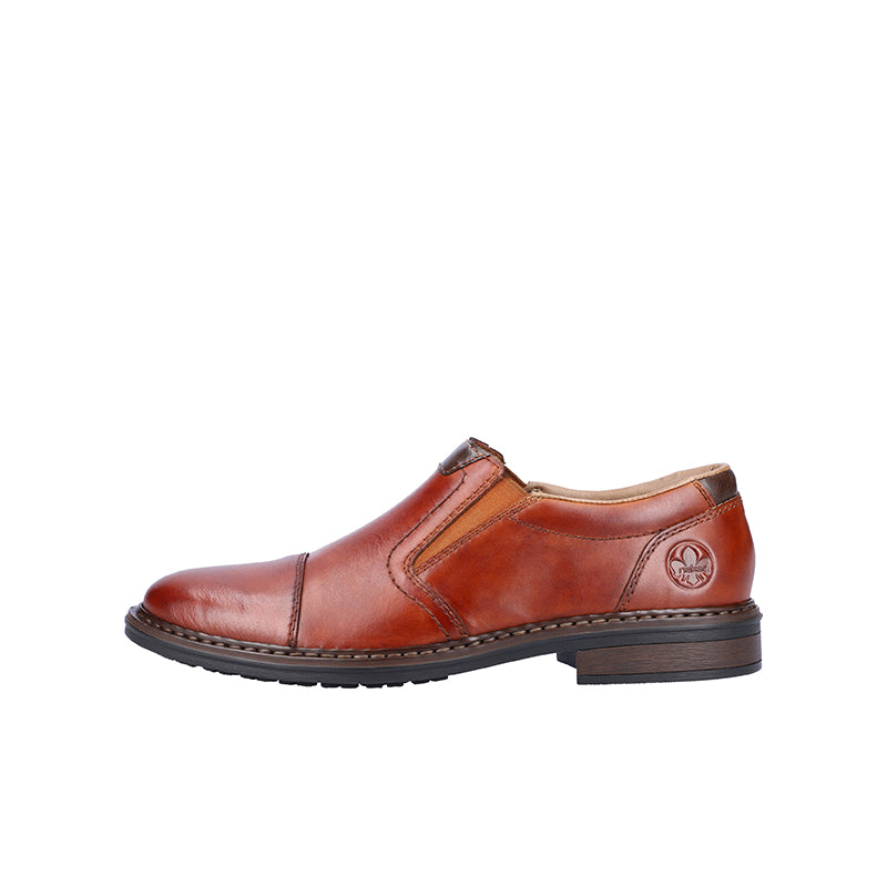 Chestnut leather slip-on business shoe, angled side view with stitched panel