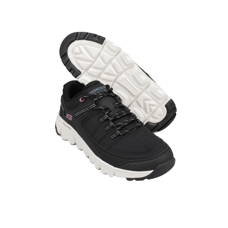 Black lace-up boot showing tread outsole and cushioned sole edge