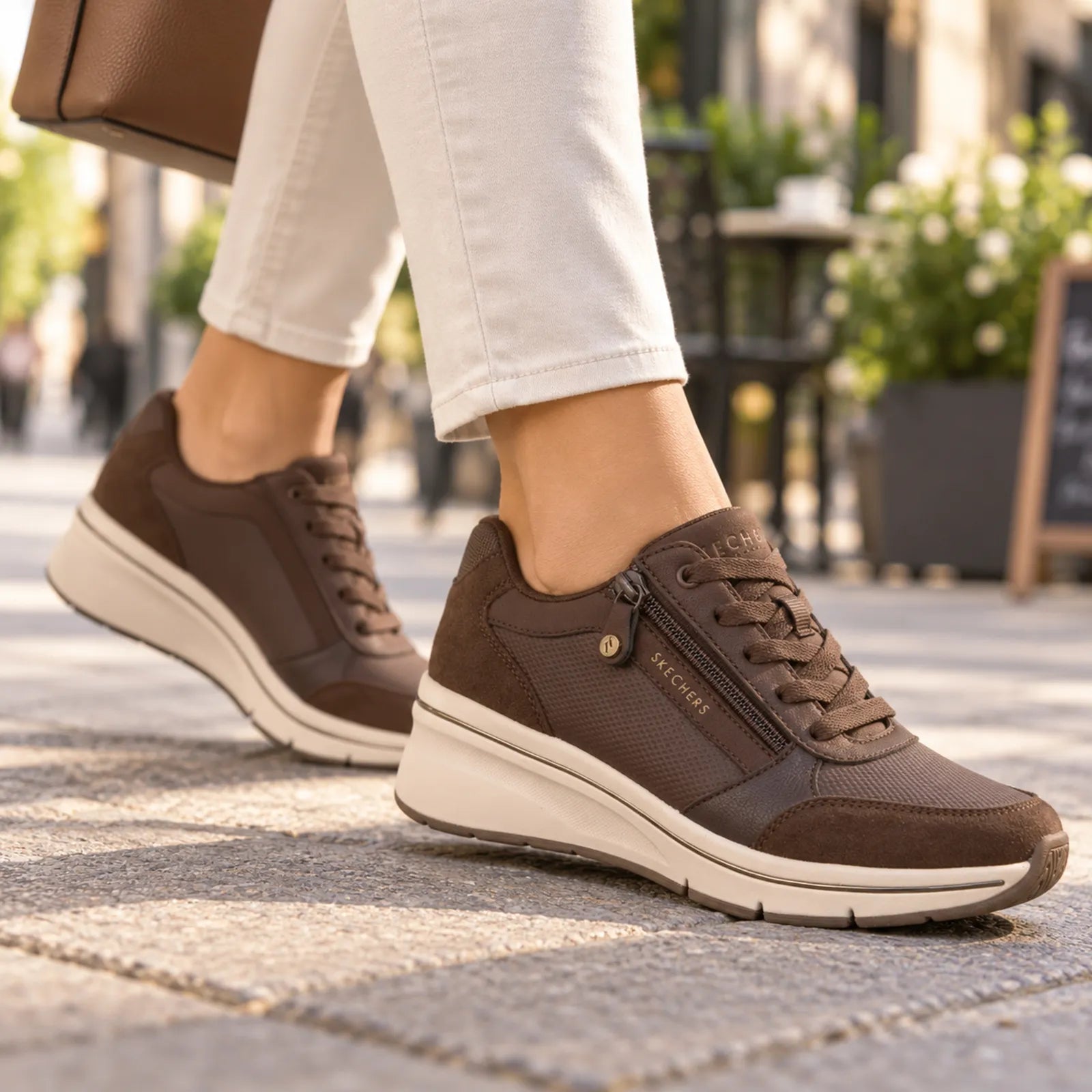 Skechers women's Brown wedge trainers styled for casual everyday wear