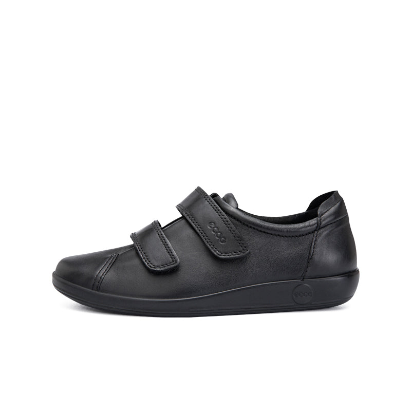 Black leather sneakers with two hook-and-loop straps, angled side view, low-profile sole