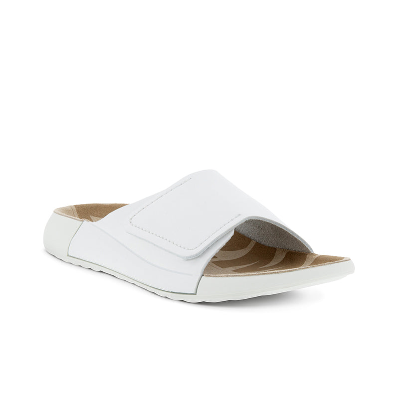 White leather slide sandal with flat sole and wide strap