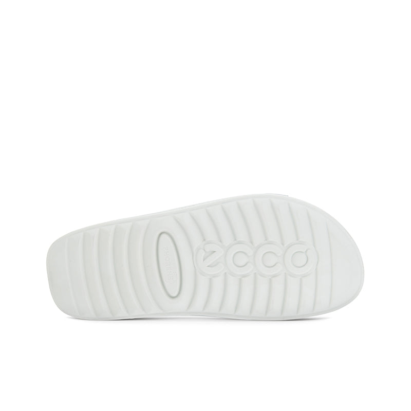 White slide sandal outsole with raised ECCO lettering and ridged traction