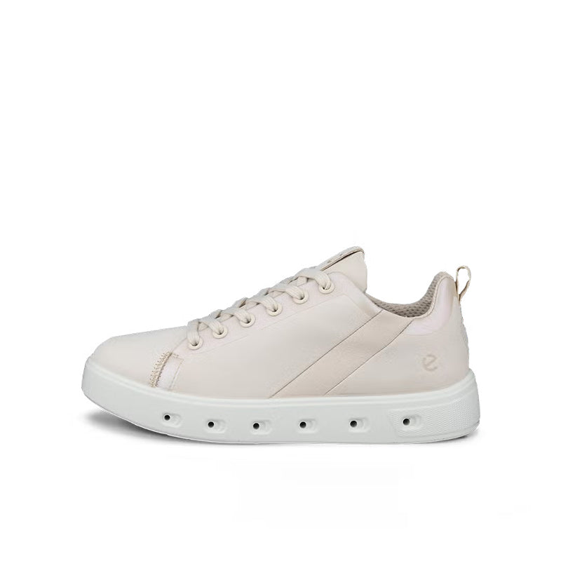 Beige leather lace-up sneakers with side panel detailing and white rubber sole