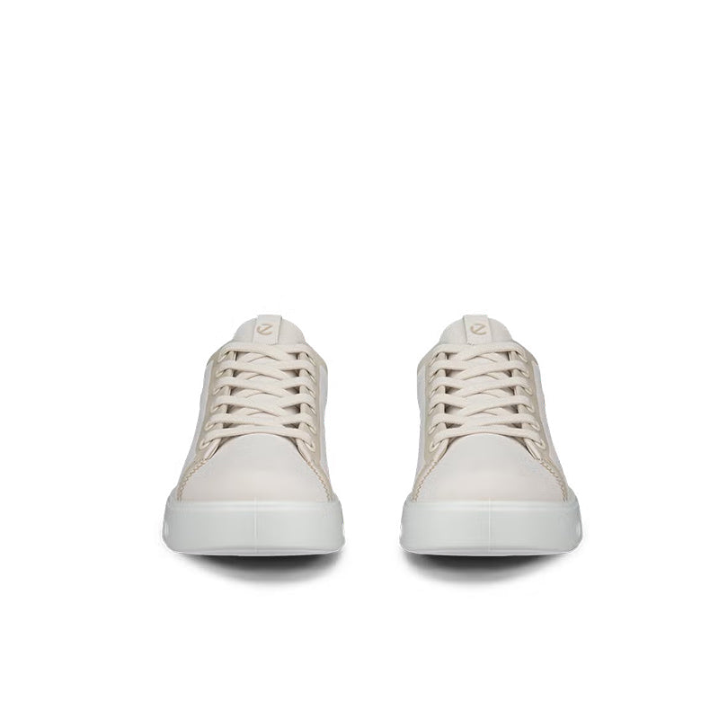 Beige leather lace-up sneakers, front view with white laces and rubber toe caps
