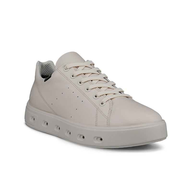 Beige leather lace-up sneakers with dark heel collar and perforated toe