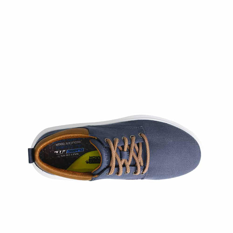 Navy textile sneaker bottom view with laces and brown-lined collar
