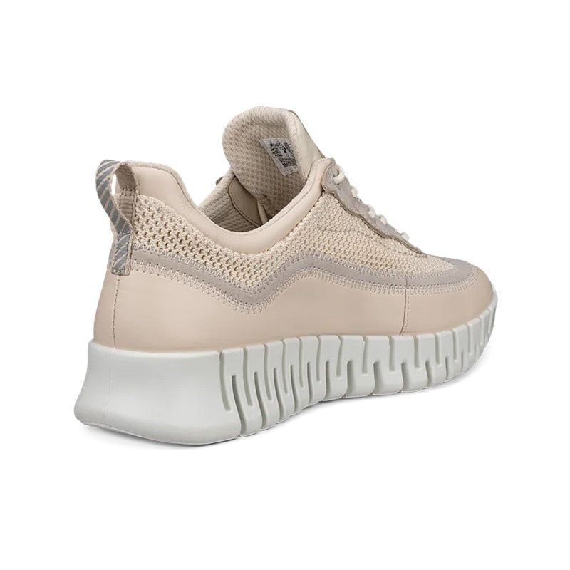 Light beige lace-up sneaker heel with textile upper and chunky white ribbed midsole