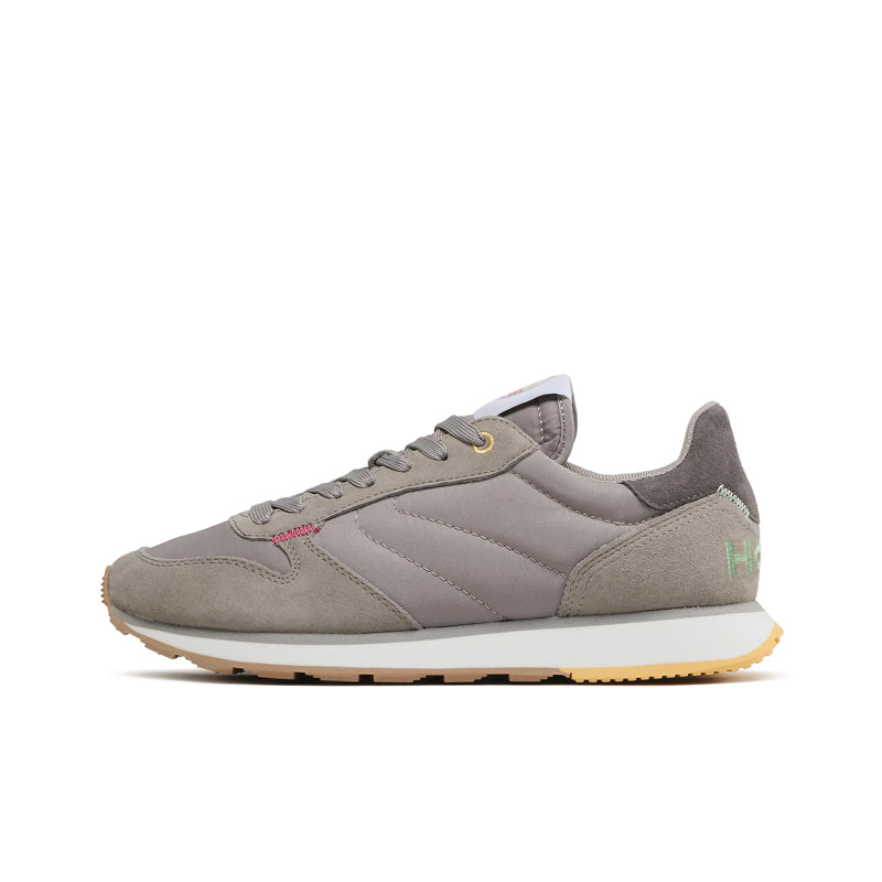 Taupe lace-up low-top sneakers with quilted side panels and textured rubber sole
