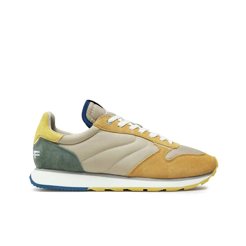 Men's casual sneakers in beige, mustard, teal and dark blue with white laces