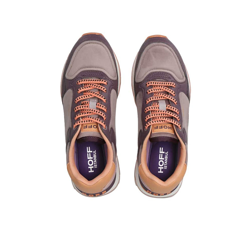 Pair of gray and purple women's sneakers with orange lace trim and cushioned tongue