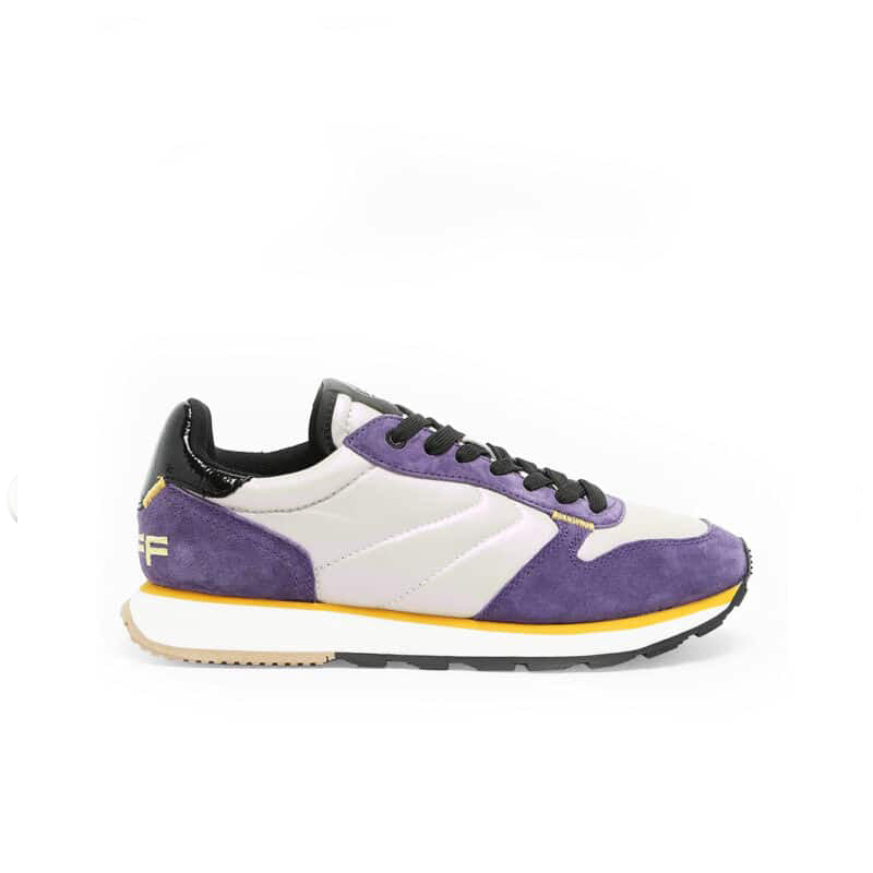 Purple and white low-top sneakers with lace-up front, black tongue, and yellow sole stripe