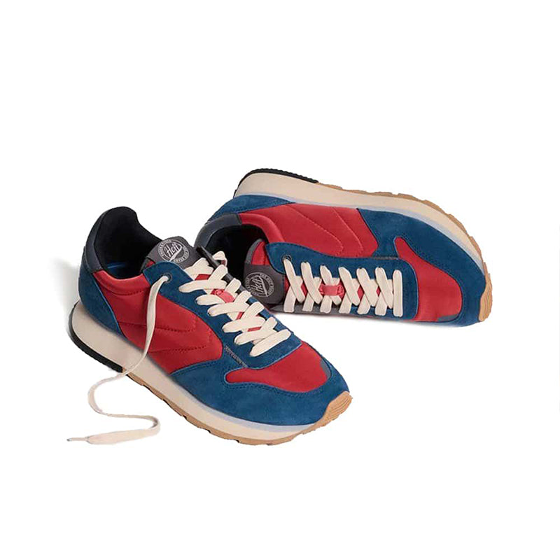 Pair of men's sneakers in red, blue, and white with beige rubber soles.